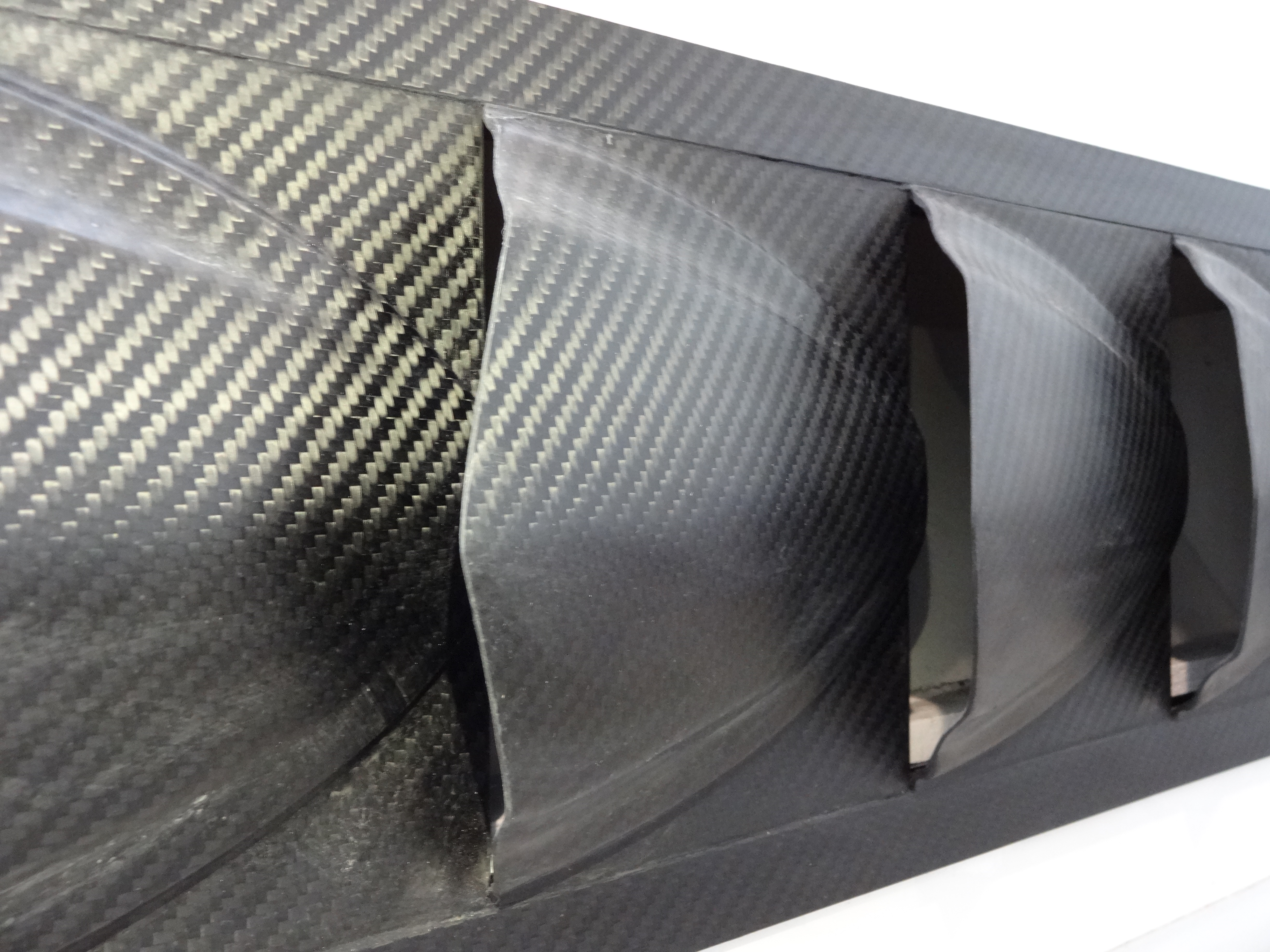 Carbon fiber air extractor